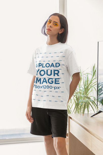 Round-Neck Tee Mockup Featuring a Woman With a Serious Pose