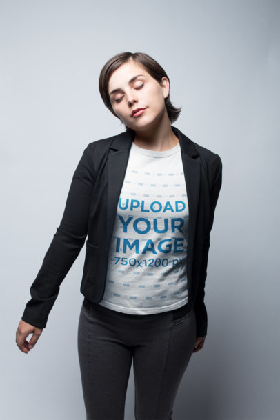 Dancing Woman Wearing a T-Shirt Mockup Against a White Background