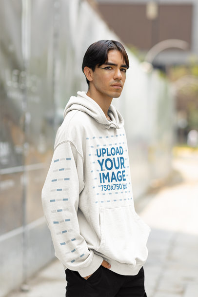 Mockup of a Man in a Pullover Hoodie with a Customizable Sleeve