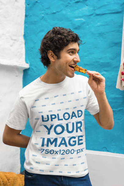 Gildan T-Shirt Mockup of a Man Eating a Street Food Snack