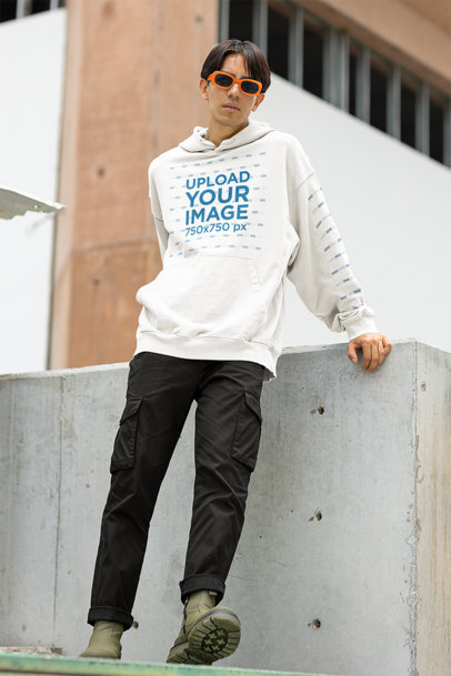 Pullover Hoodie Mockup Featuring a Man with Sunglasses 