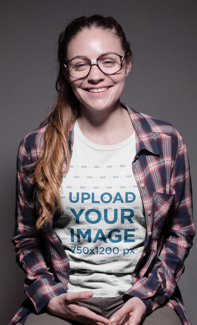 Smiling Geek Woman Wearing a Round Neck Tee Mockup and Glasses