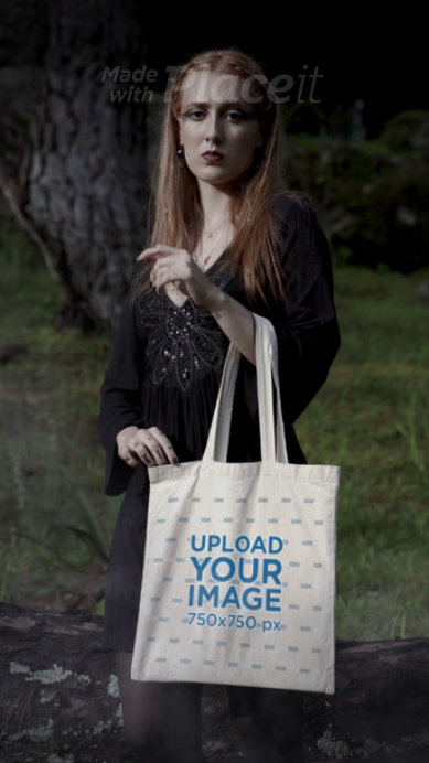 Tote Bag Video Featuring a Woman With a Witch-Themed Outfit Posing in a Wicca Setting