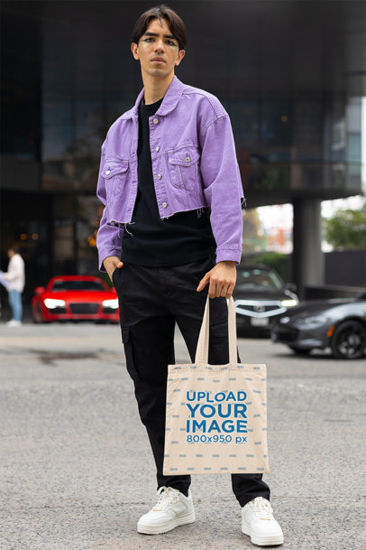 Tote Bag Mockup Featuring a Man With a Purple Jacket m29318