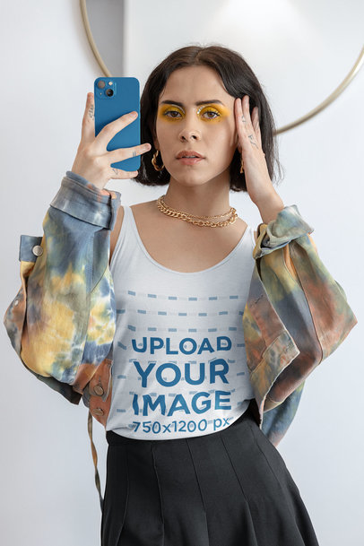 Tank Top Mockup Featuring a Woman Holding a Cell Phone