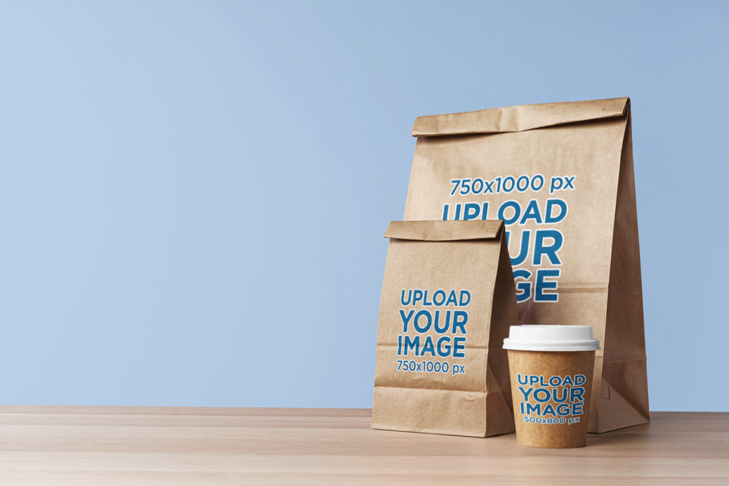 Placeit - Food Packaging Mockup Featuring Two Paper Bags and a Coffee Cup