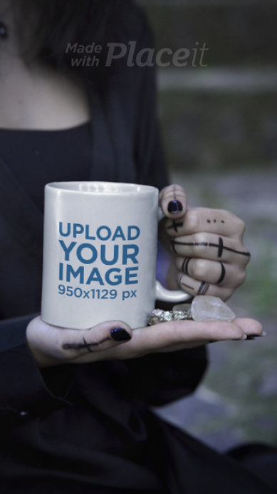 Video of an 11 Oz Mug Featuring a Woman Posing in a Wicca-Themed Setting