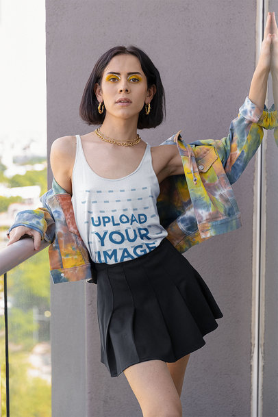 Mockup of a Woman Wearing a Bella Canvas Tank Top Under a Colorful Jacket