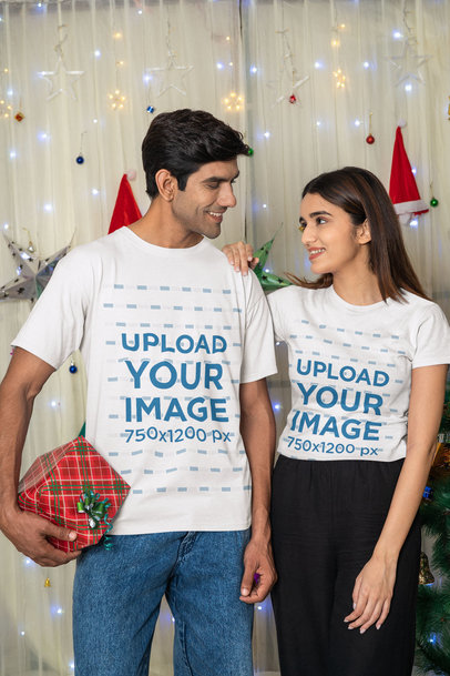 Gildan Tee Mockup of a Happy Couple Celebrating Christmas