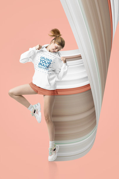 Pullover Hoodie Mockup of a Woman Spinning in a Studio
