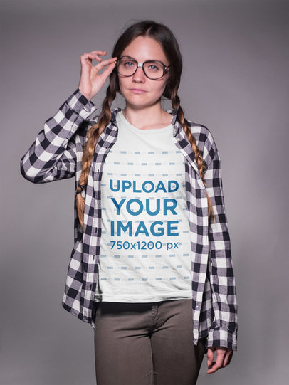 Nerd Woman with Braids Wearing a T-Shirt Mockup and Glasses