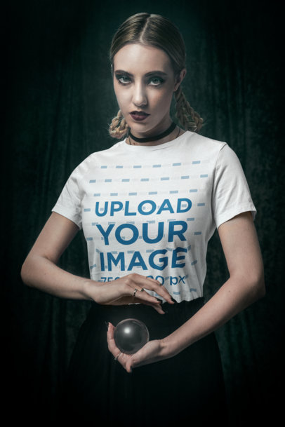 Bella Canvas T-Shirt Mockup Featuring a Woman With a Crystal Ball