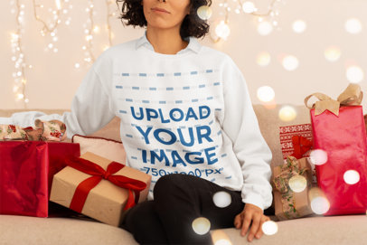 Sweatshirt Mockup of a Woman Surrounded by Christmas Presents