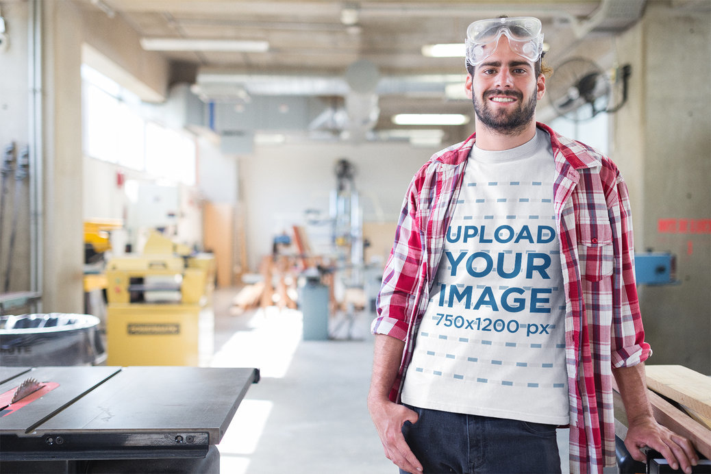 Happy Carpenter Wearing a T-Shirt Mockup at the Shop