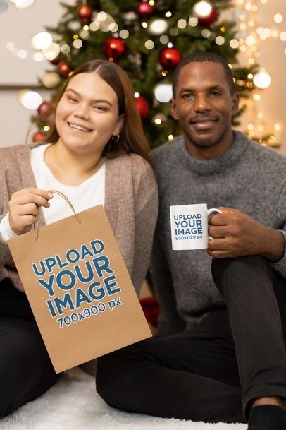 Gift Bag and Mug Mockup of a Happy Man and Woman Posing in a Christmas Setting