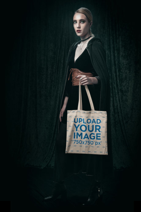 Sublimated Tote Bag Mockup of a Woman With a Wicca-Themed Outfit
