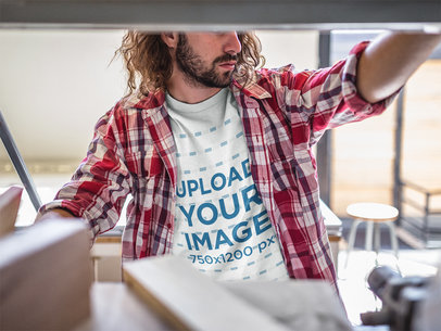 Long-Haired Carpenter Wearing a T-Shirt Mockup at the Shop a20172
