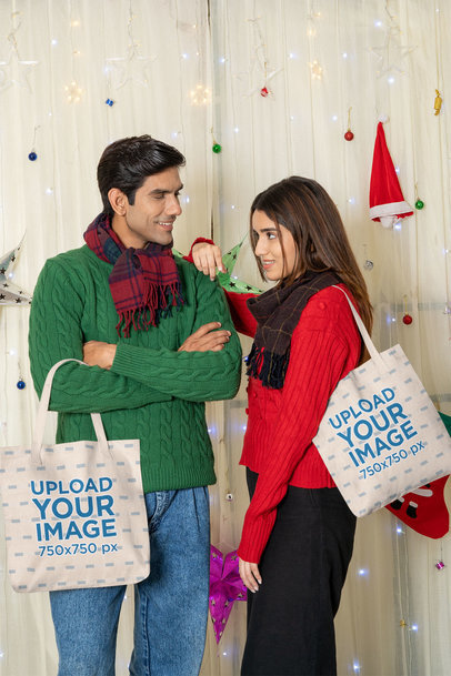 Tote Bag Mockup of a Happy Couple Celebrating Christmas