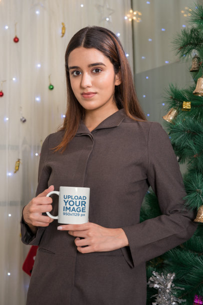 Mug Mockup Featuring a Woman in a Christmas Setting