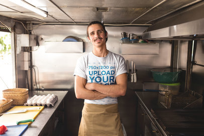 Cook Wearing a T-Shirt Mockup and an Apron in his Food Truck