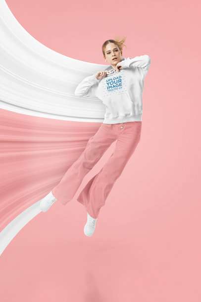 Pullover Hoodie Mockup of a Woman Suspended in the Air m29229