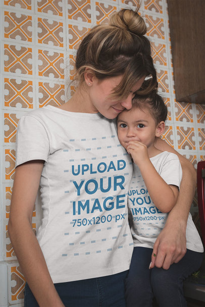 Mom Wearing a T-Shirt Mockup Hugging her Daughter