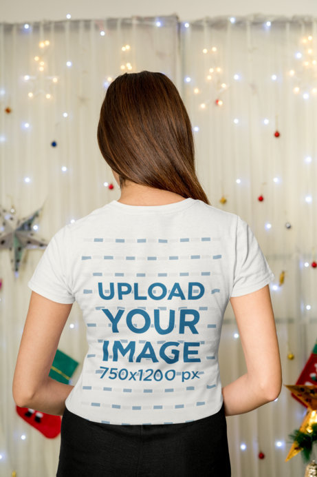 Back View Gildan Tee Mockup of a Woman Posing With Christmas Lights