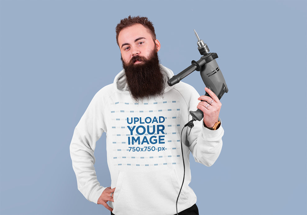 Hoodie Mockup Featuring a Bearded Man Holding a Power Drill
