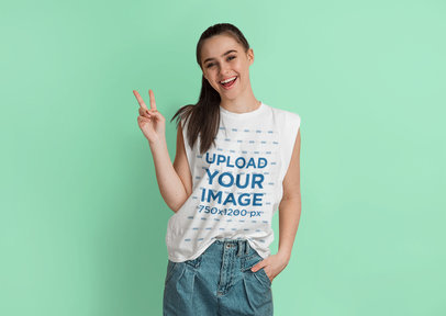 Sleeveless Shirt Mockup Featuring a Cheerful Woman Doing the Peace Sign