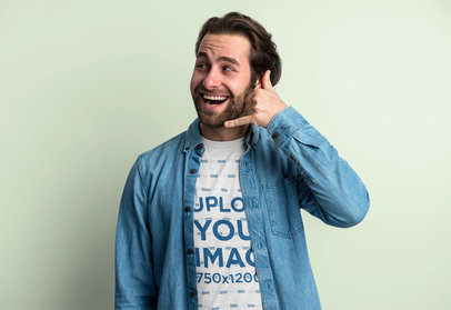Heathered T-Shirt Mockup of a Happy Man Making a Phone Hand Gesture m22610 r-el2