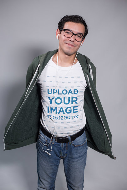 Mockup of a Nerdy Man Showing off His T-Shirt with Hands in His Pockets