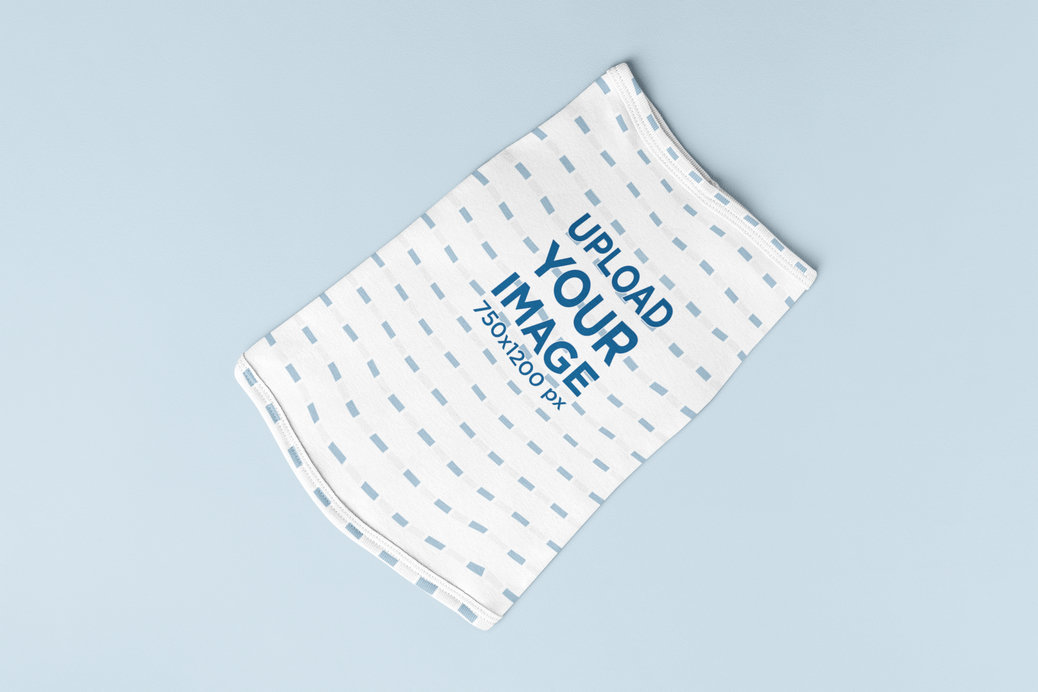 Mockup of a Sublimated Pet Tank Top Placed Over a Colorful Surface