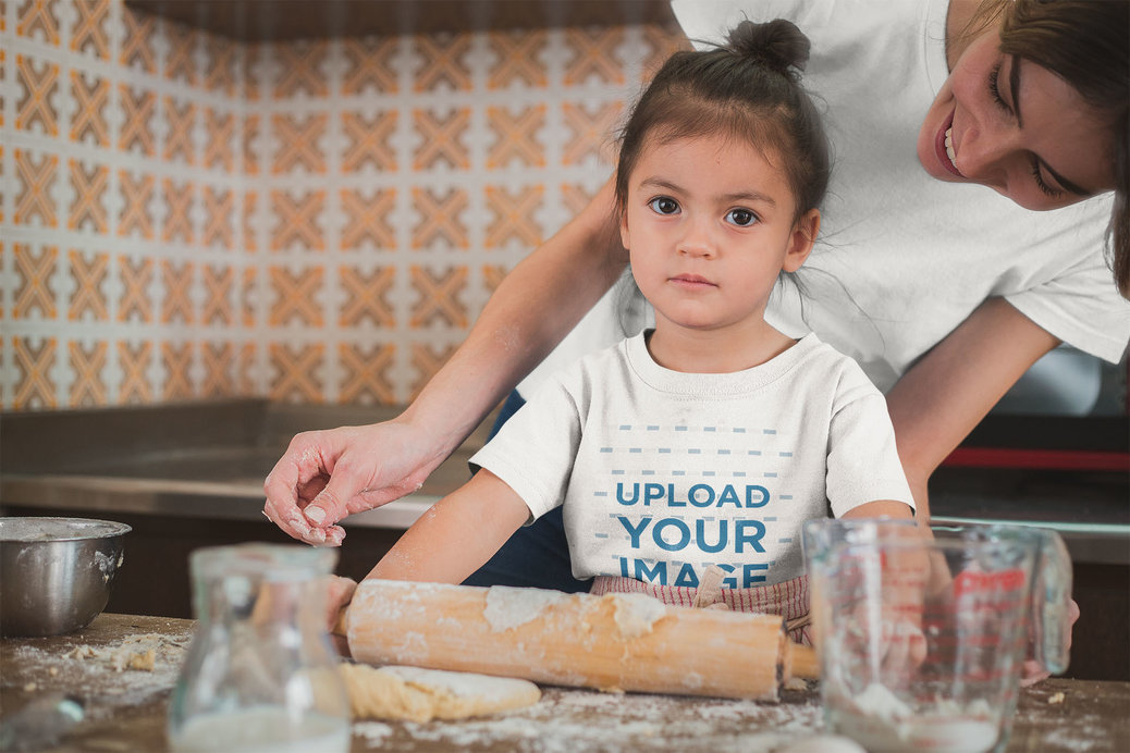 Girl Learning how to Bake Wearing a T-Shirt Mockup with her Mom