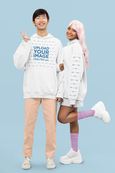 Pullover Hoodie Mockup Featuring a Smiling Kawaii Couple
