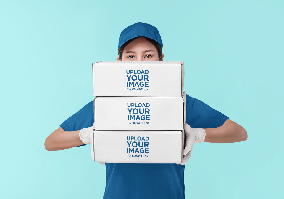 Mockup of a Delivery Woman Carrying Three Cardboard Boxes