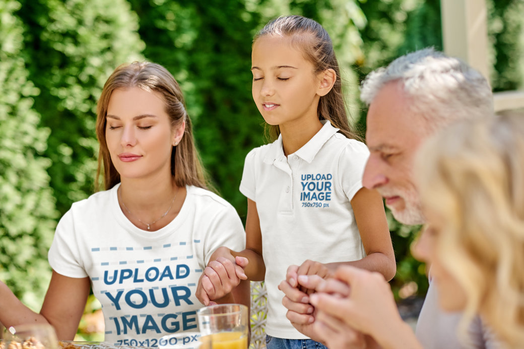 Polo Shirt and T-Shirt Mockup of a Family Holding Each Other's Hands for a Group Prayer