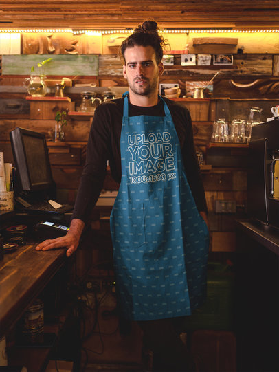 Long-Haired Dude Wearing an Apron Mockup at a Pub a19870
