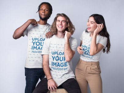 Interracial Group Featuring a Man with a White Guy and an Asian Woman Wearing T-Shirts Mockup