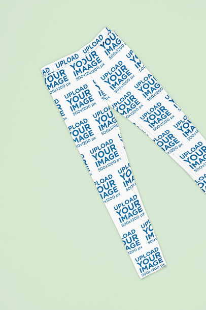 Sublimated Leggings Mockup Featuring a Color-Customizable Surface