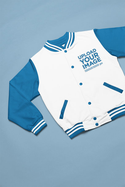 Mockup of a Bomber Jacket Placed Over a Colorful Surface