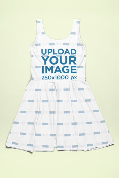 Back-View Mockup of a Sublimated Skater Dress Placed over a Solid Surface