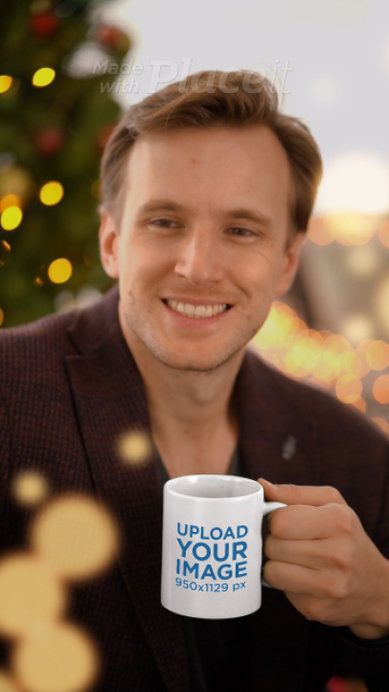 Video of a Happy Man Holding a Coffee Mug at a Christmas Party