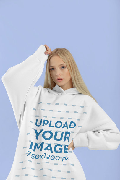 Mockup of a Woman in an Oversized Pullover Hoodie