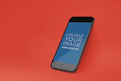 Space Gray iPhone 8 Mockup Angled Over a Solid Surface