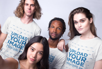 Selfie of Interracial Friends Wearing T-Shirts Mockup Against a White Background