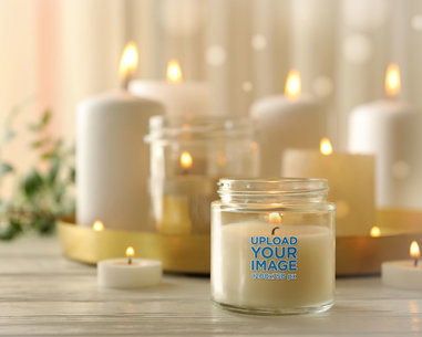 Mockup of a Candle Featuring a Comfy Setting m30362 r-el2