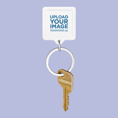Keychain Mockup Featuring a Key and a Customizable Background m30344 r-el2