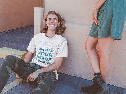 Happy Blonde Dude Wearing a T-Shirt Mockup on the Street a20100