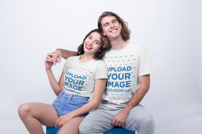 Interracial Couple of an Asian Woman and a Blonde Guy Wearing Shirts Mockup Holding Hands