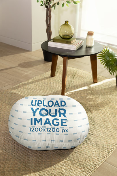 Mockup of a Sublimated Floor Pillow Lying on a Jute Mat m30942